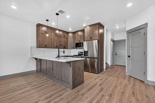 Building Photo - BRAND NEW3 BED 2.5 BATH TOWNHOME WITH 2 STALL GARAGE