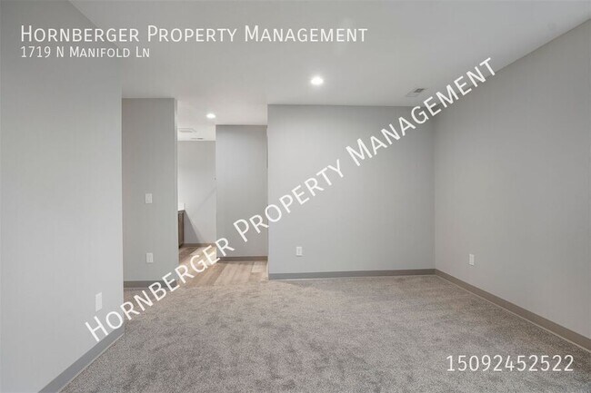 Building Photo - 1719 N Manifold Ln