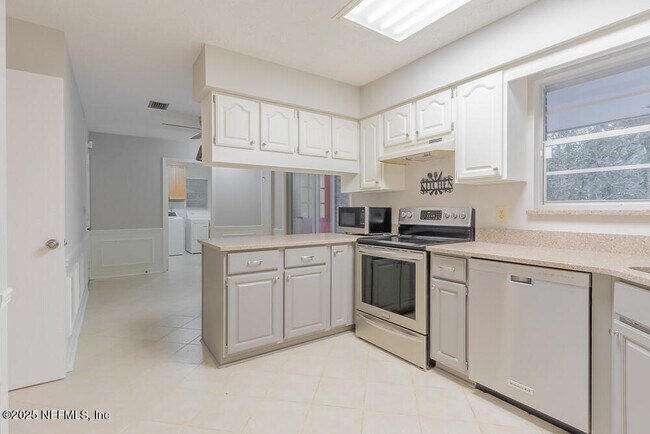 Building Photo - 5430 Woodwind Terrace