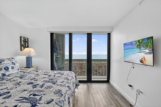 Building Photo - 9940 S Ocean Dr