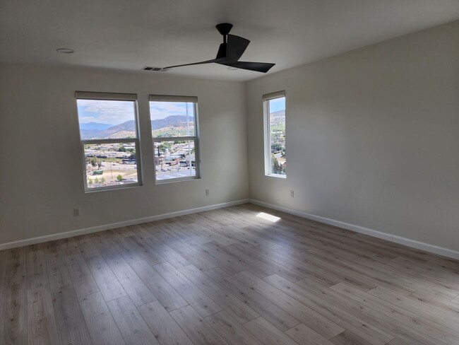 Building Photo - Exclusive, 3 bedroom townhome in sought-af...