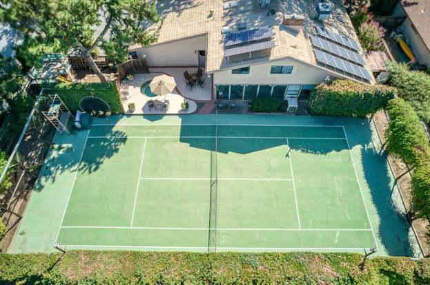 backyard terrace with year-round heated jacuzzi and full size tennis/pickleball court - 4569 E Alamos Ave