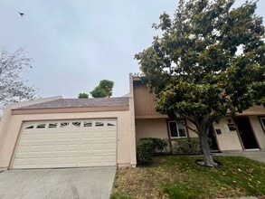 Building Photo - Stunning 4BR Townhome with Hardwood Floors, Private Patio, Community Pool & 2-Car Garage!