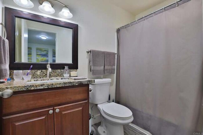 Building Photo - Coming in June......Sunny & Spacious 3BR Condo – Minutes from the Beach