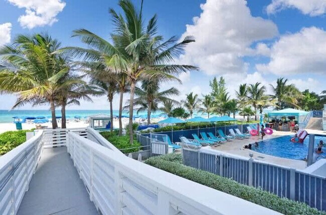 Building Photo - 18683 Collins Ave