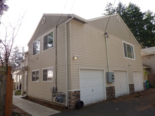 Primary Photo - Spacious Townhome Nestled Down Private Drive