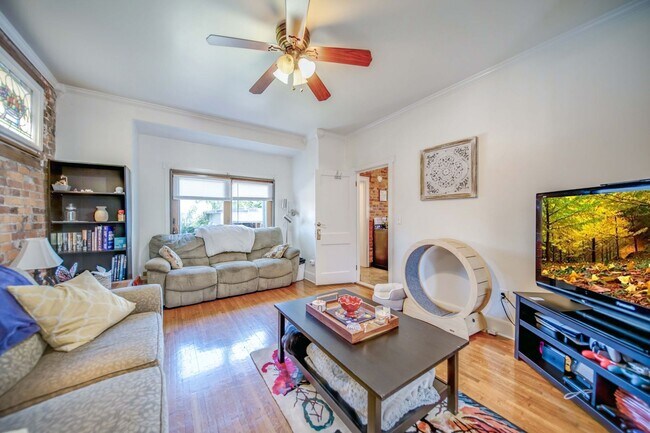 Building Photo - Charming 5-Bedroom Home with Exposed Brick and Modern Upgrades