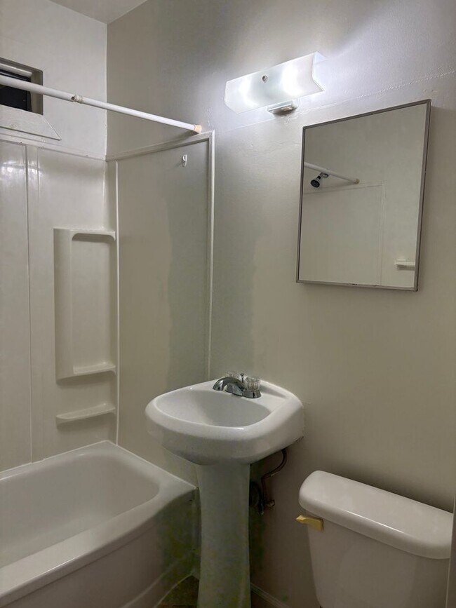 Building Photo - Newer windows, hardwood floors, a big pantry — and 9th Street a short walk away.