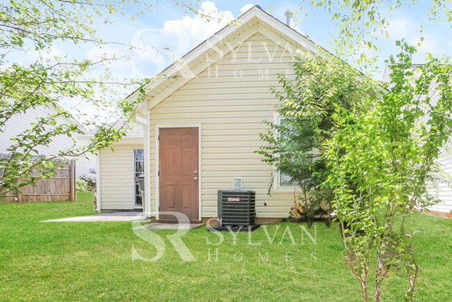 Building Photo - Welcome to this beautiful and sun-filled 3...