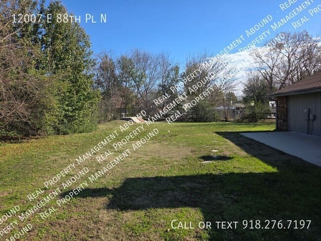 Building Photo - 12007 E 88th Pl N