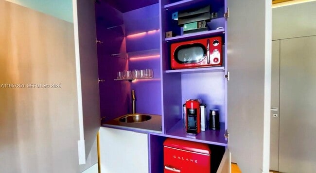 Building Photo - 5255 Collins Ave