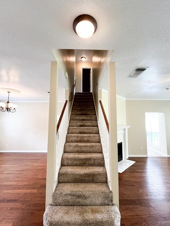 Building Photo - Available NOW!!!! This beautiful 2 story, 4 bedroom, 2 bath, two car garage with garage door open...