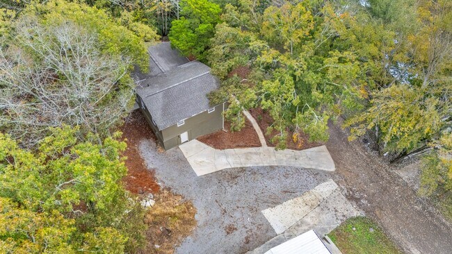 Building Photo - Retreat Like Feel + Practically New! 4 Beds, 3 Baths, Over 2,000 Sq Ft. with Glimpses of Nickajac...