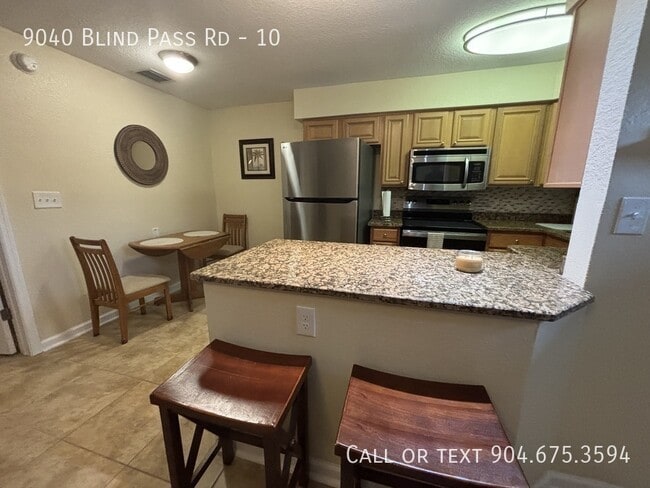 Building Photo - 9040 Blind Pass Rd