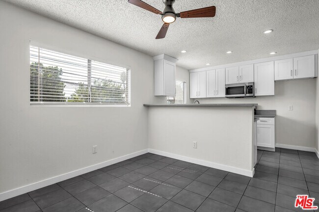 Building Photo - 7343 Comstock Ave