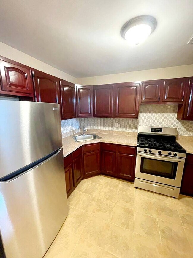 Building Photo - 74-22 Rockaway Blvd