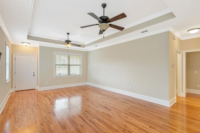 Building Photo - Captivating 3 bedroom house available for rent, wood floors, garage, screened porch renting for $...