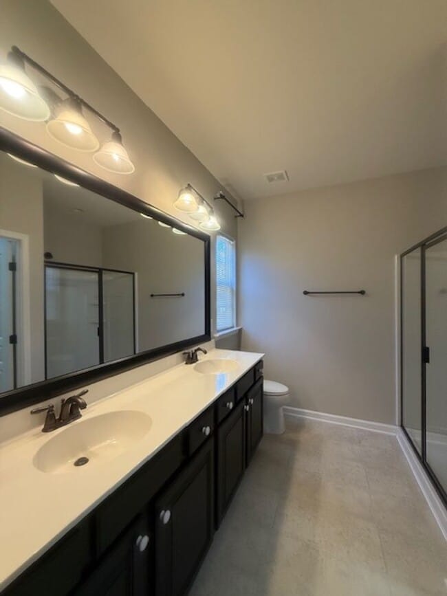 Building Photo - Elevated Living at Carolina Preserve – Car...