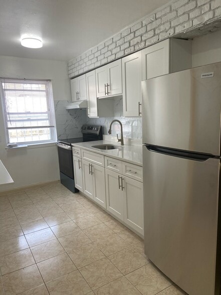 Building Photo - 8815 Pitkin Ave