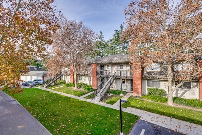 Building Photo - New Vinyl Plank Flooring, Fresh Interior Paint, 1 Car Garage + 1 Assigned Outdoor Parking Space -...