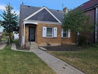 Building Photo - 5249 N Osceola Ave