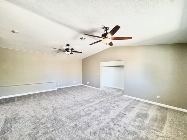 Building Photo - Spacious 4BD/3BA Pool Home with Dual Prima...
