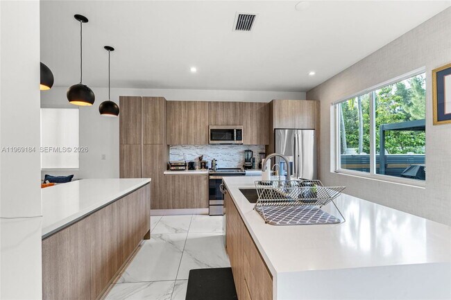 Building Photo - Northwest 68th Terrace, Doral, FL 33178 - 4 BR 3.5 BA single-family home