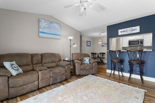 Building Photo - Welcome to Coastal Living at Harbor Landing Condominiums!