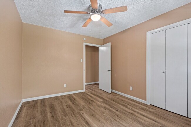 Building Photo - Furnished Option, Modern Comfort & Private Gated Patio!