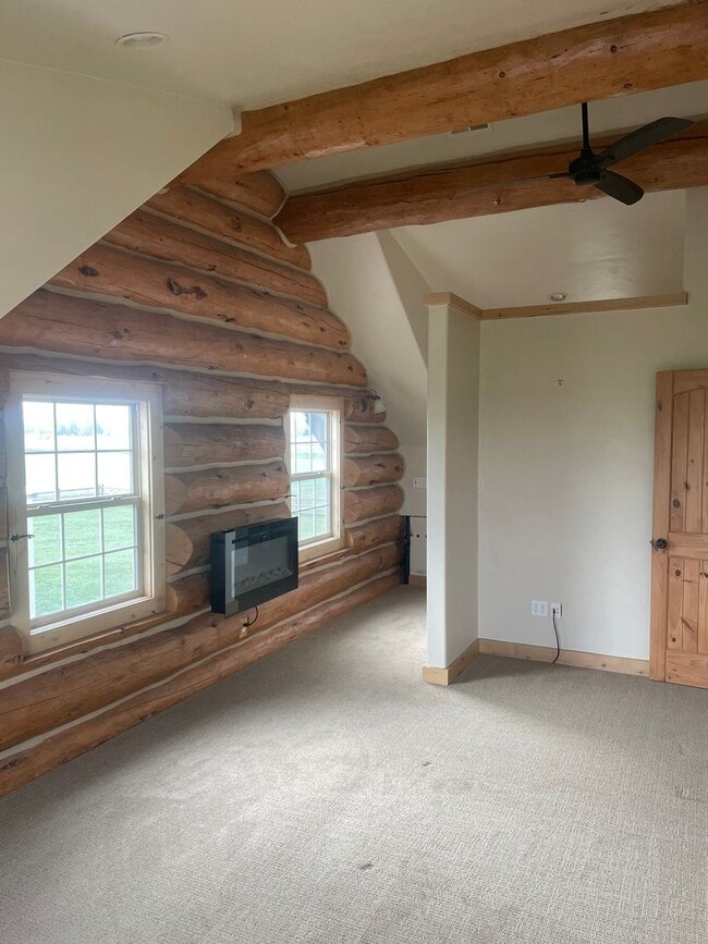Building Photo - Charming Log Home For Rent with Large Shop & Spacious Yard