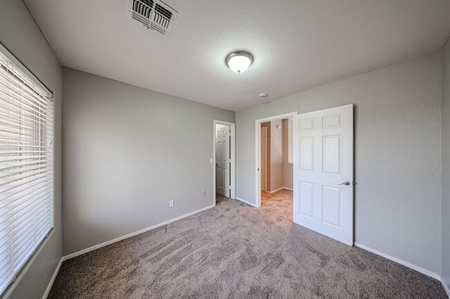 Building Photo - Welcome to this spacious 4 bedroom, 2.5 ba...