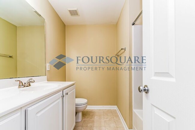 Building Photo - Spacious 2-Bed / 3.5-Bath Townhome with Hardwood Floors, Lower-Level Bonus Room & Private Outdoor...