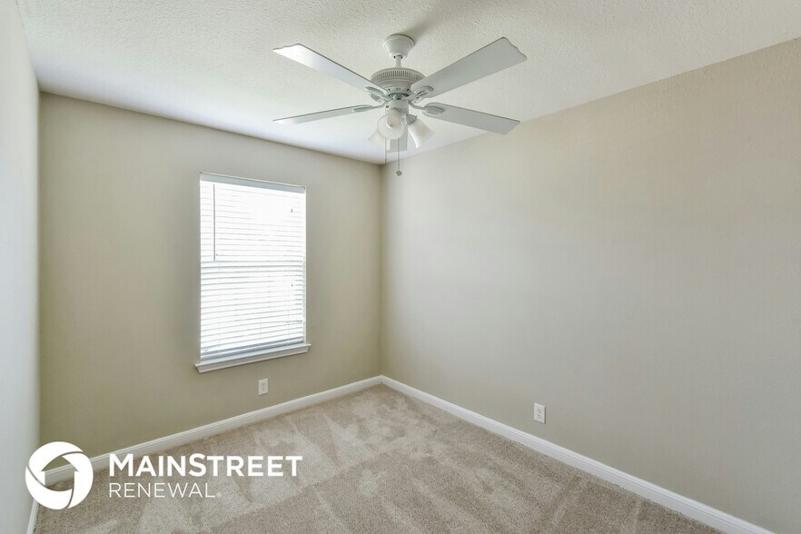 Building Photo - 9030 Trumpet Cir