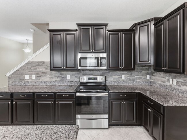 Building Photo - Stunning 3 BR + LOFT/2.5 BA /2-Car Garage townhome in the highly desirable GATED community of Hid...