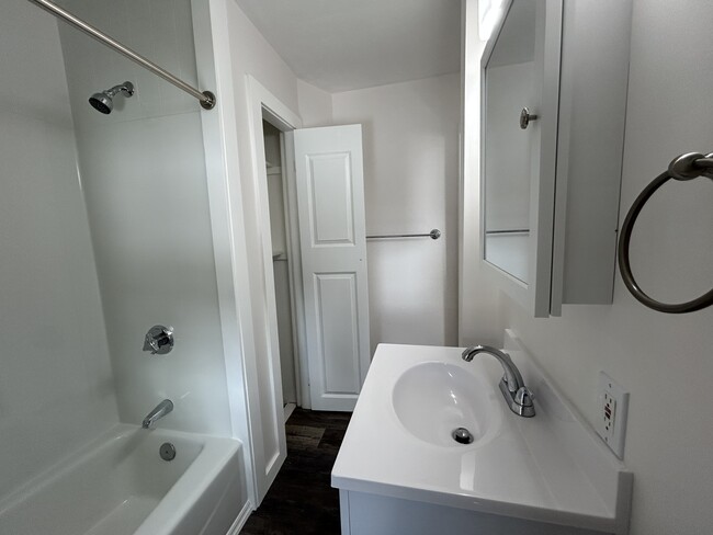 Bathroom with large linen closet. - 10 Everett St