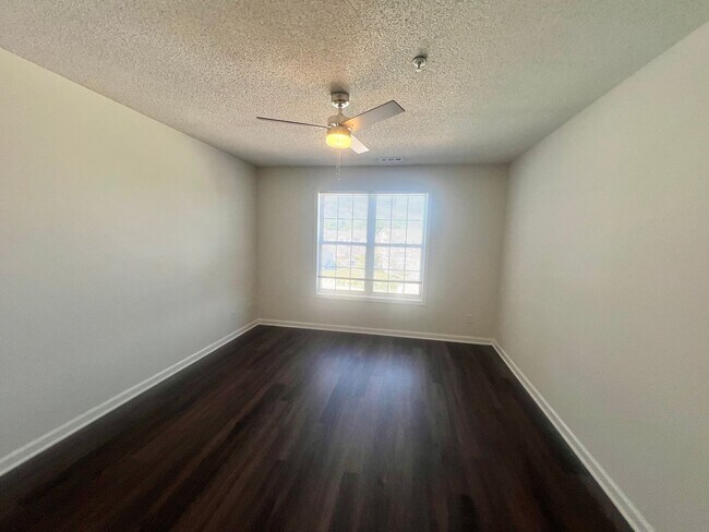 Building Photo - RENT SPECIAL! Freshly Painted! New Luxury ...