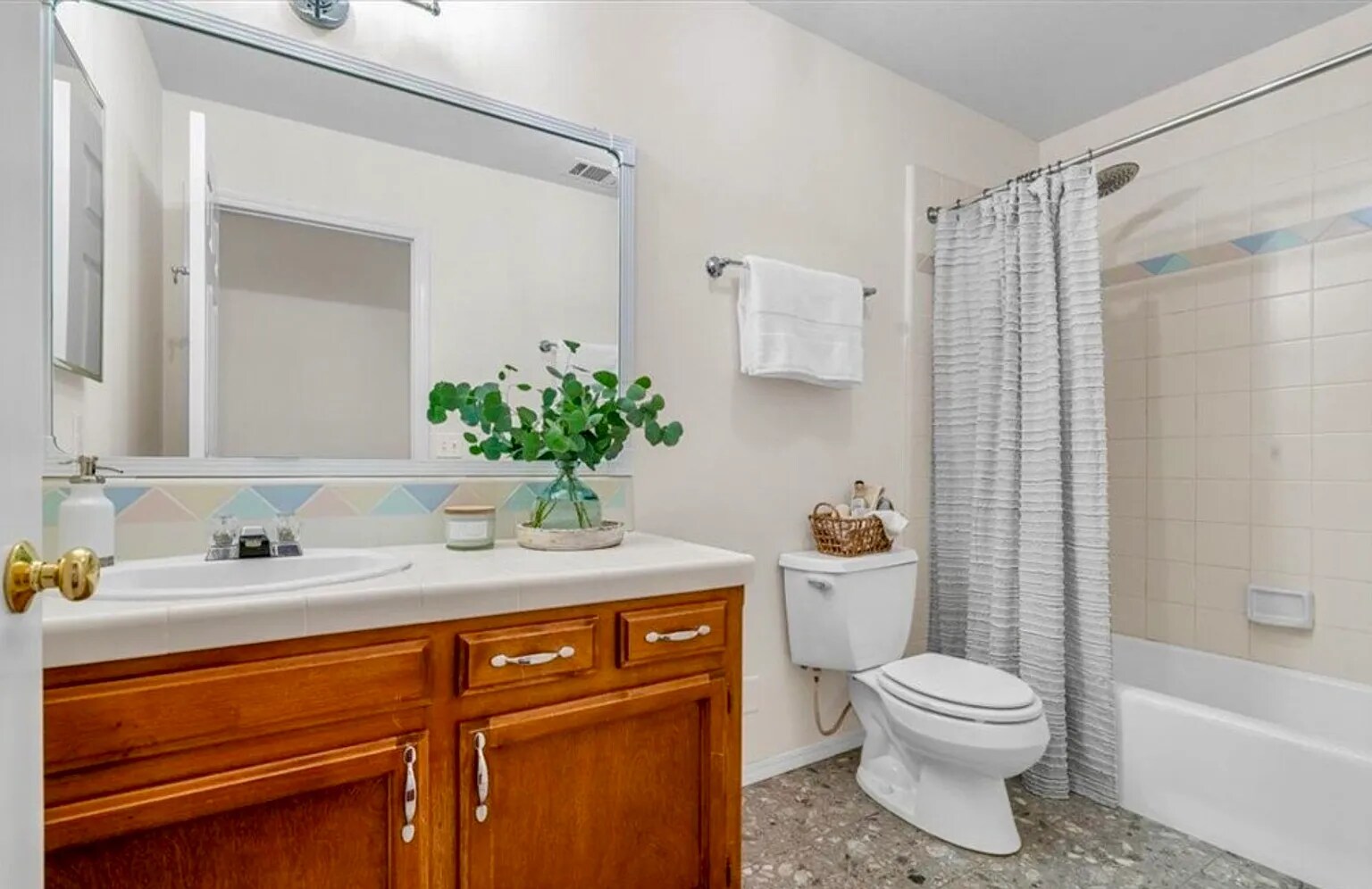 Upstairs Hall Bathroom (note: pastel tile has been painted and new toilet and faucet installed). - 221 Appy Way