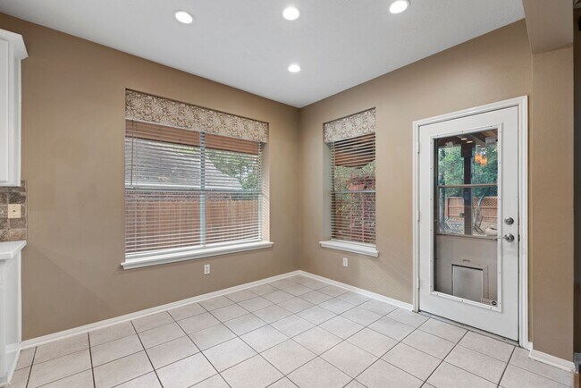Building Photo - The Perfect Woodlands Retreat: Steps from ...