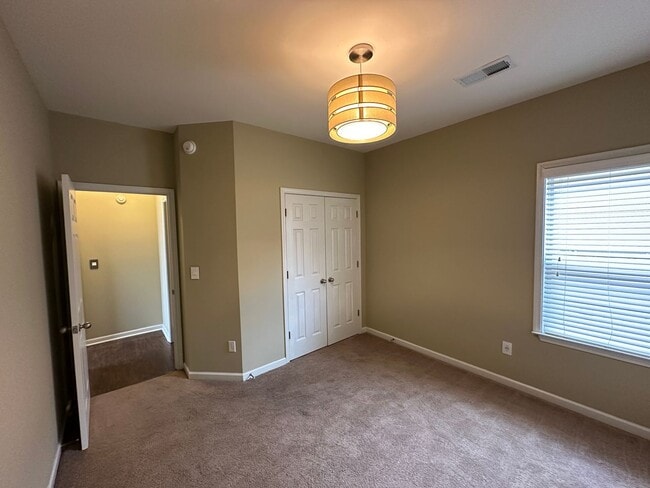 Building Photo - Updated 3 bd 2 bath with large fenced yard.  Pets are allowed!