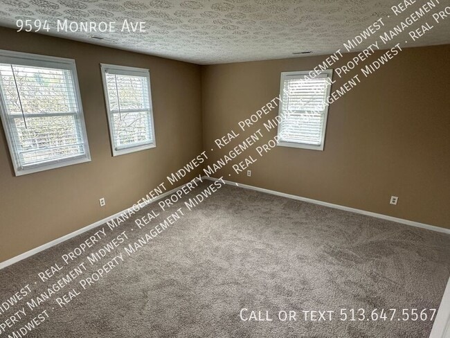 Building Photo - 9594 Monroe Ave