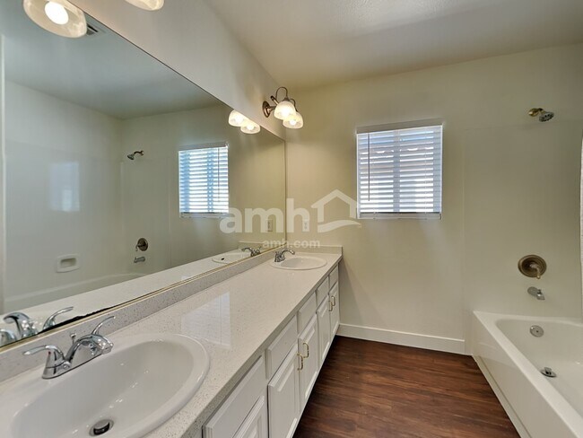 Building Photo - 10749 Artesia Wells St