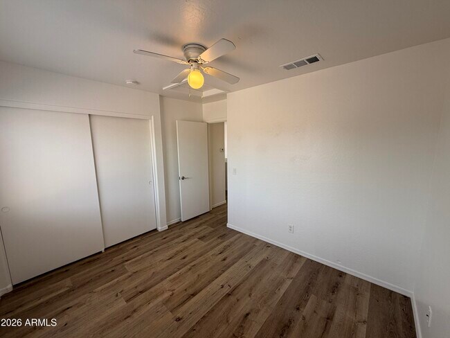 Building Photo - 12930 W Paradise Dr
