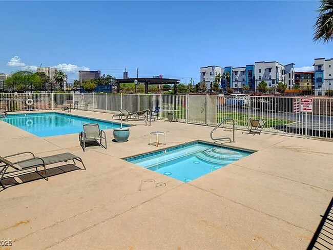 Building Photo - Enjoy resort-style living in this 2 Bed 2 Bath Condo with Stunning Strip Views in the Wimbledon C...