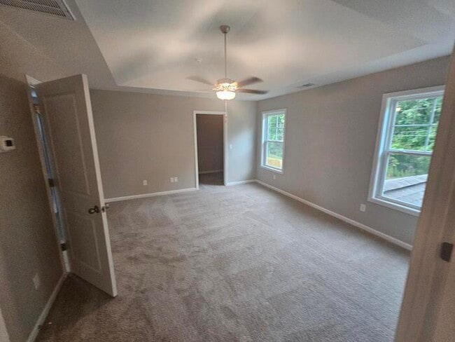 Building Photo - 1 year old 5 bedroom home w community pool!