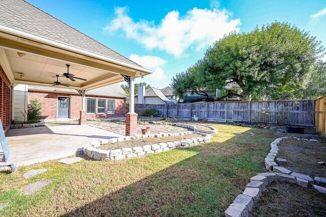 Building Photo - Discover this stunning one-story corner lo...