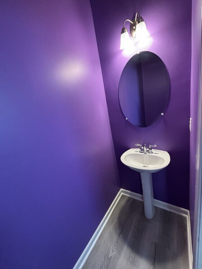 Building Photo - Gated Private Community! Spacious 3 Bedroom and 2.5 Bath End Unit Townhome