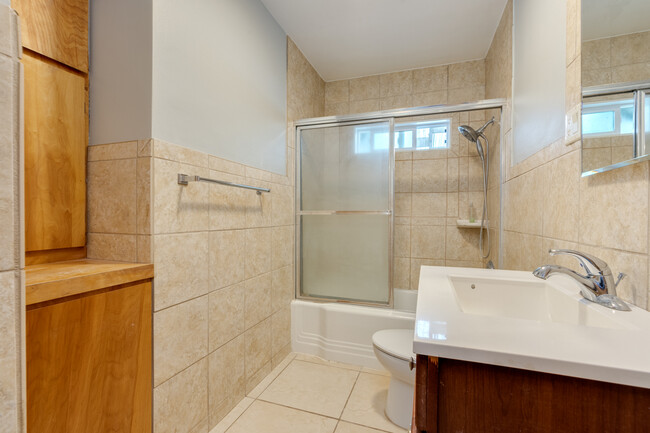 Bathroom has a tub, shower and storage - 211 Farview Drive