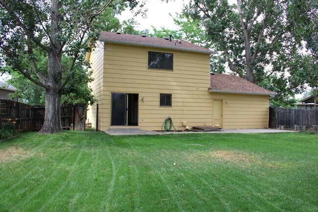 Building Photo - Charming Home with Great Outdoor Space & 2-Car Garage