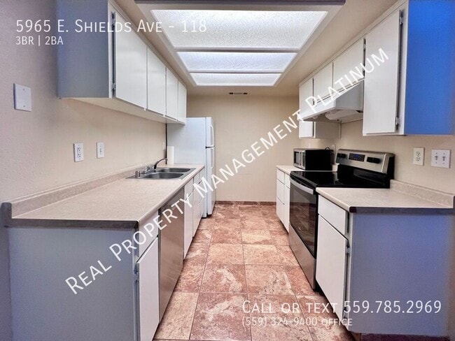 Building Photo - 5965 E Shields Ave