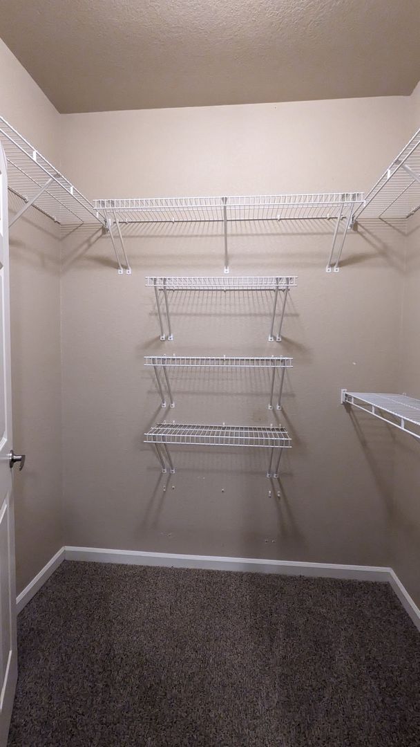 Building Photo - TWO BEDROOM/TWO BATHROOM CONDO WITH AMENITIES IN GATED COMMUNITY!